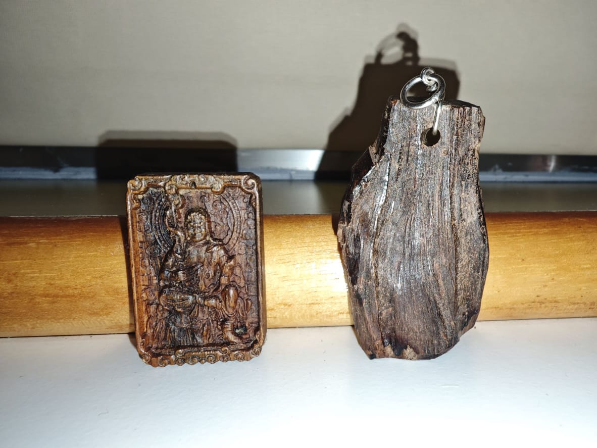 Carved and natural pendants